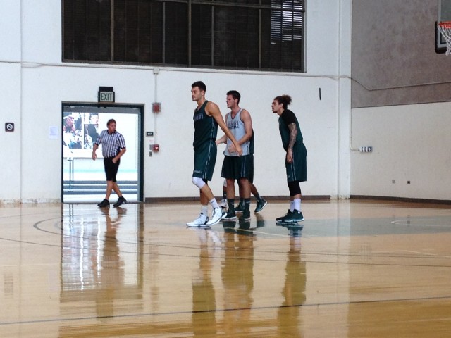Hawaii forwards Stefan Jankovic and Isaac Fotu (both in green) were back in action during Saturday's officiated scrimmage.