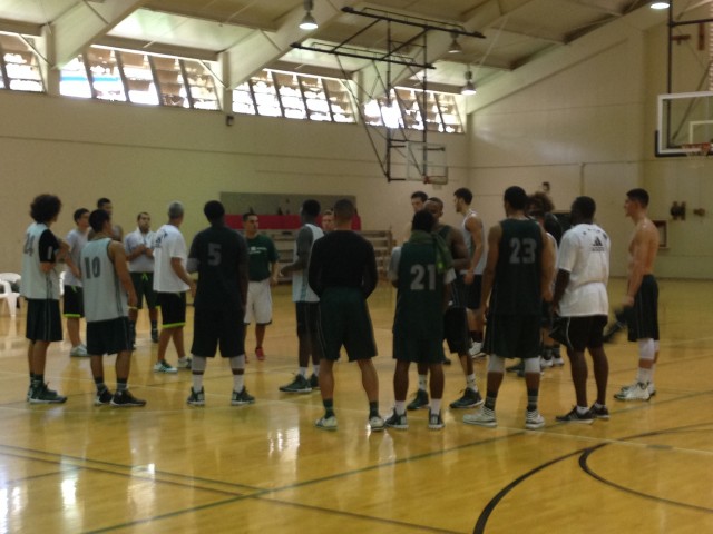The Rainbow Warriors gathered after their intrasquad scrimmage in Klum Gym.