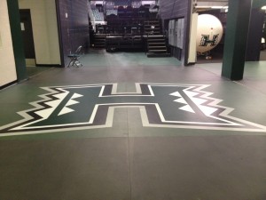 There's a "H" logo  on the new floor inside the back entrance to the Stan Sheriff Center.