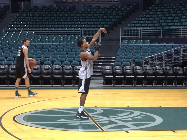 Garrett Nevels attempted left-handed free throws after Sunday's practice.