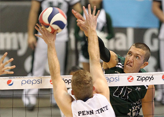Hawaii outside hitter Brook Sedore (11) powers his kill attempt through the block of Penn State setter Taylor Hammond. Darryl Oumi / Special to the Star-Advertiser