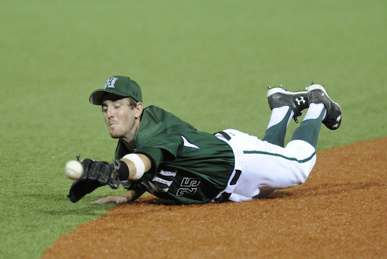 Hawaii shortstop Jacob Sheldon-Collins injured his shoulder making a diving catch on Thursday night. Photo by Bruce Asato/Star-Advertiser.