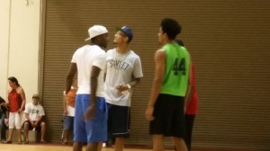 Isaac Fleming, Negus Webster-Chan, Aaron Valdes and Benjy Taylor (behind Valdes) chatted at the summer league.