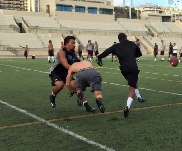 Nickelback Solomon Matautia, slotback Dylan Collie, cornerback Ne'Quan Phillips … and the ball. 