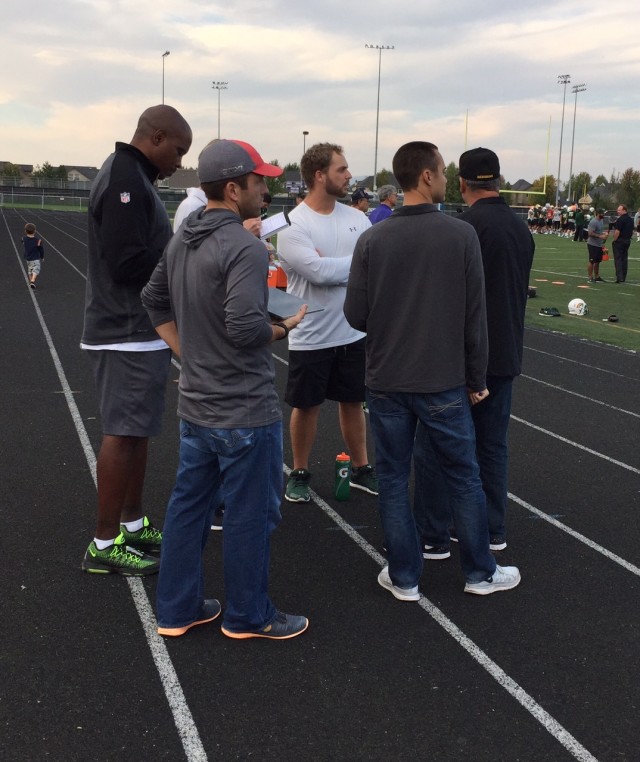Strength/conditioning coach Gary Beemer meets with NFL scouts