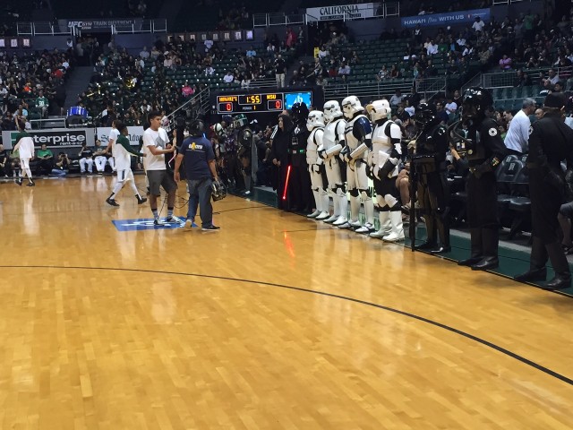 Star Wars characters guard the court during warms up.