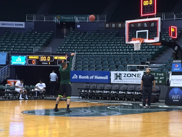 Hawaii guard Quincy Smith warmed up for Monday's late-night contest against Nevada.