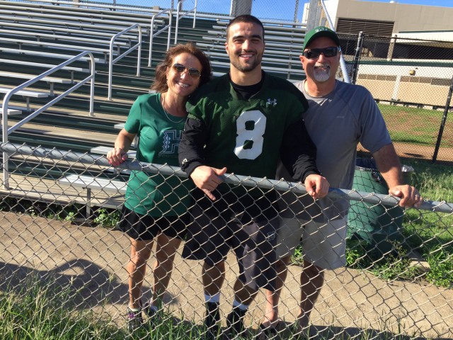 Inside linebacker Julian Gener and his parents 