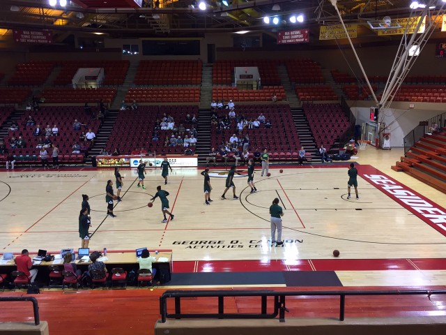 The Rainbow Wahine basketball team warms up at BYU Hawaii's Cannon Activities Center before taking on BYU.