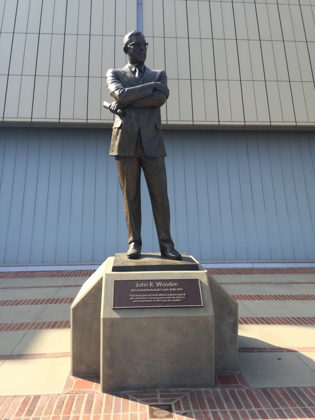 The statue of John Wooden outside Pauley Pavilion.