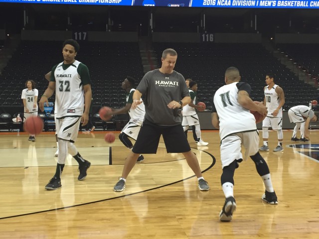 Assistant coach Adam Jacobsen put the Hawaii guards through practice drills.