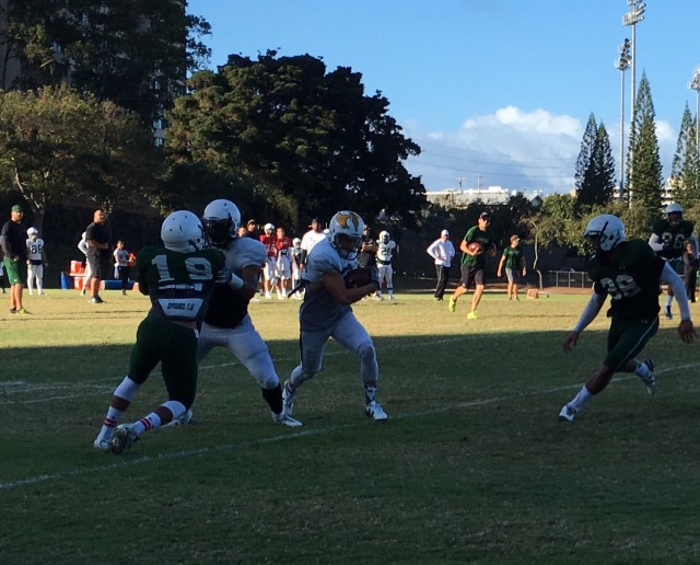 Slotback Dyan Collie finds an opening on a bubble screen