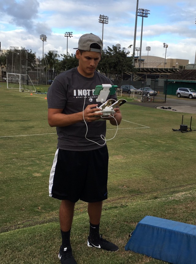 Joey Vela is in charge of operating the drone that hovers over workouts. Most of the footage will be used for special projects, but the bird's-eye view also is helpful in providing unique angles of practice drills. 