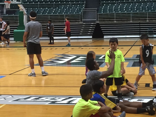 Larry Lewis high-fived campers while Drew Buggs officiated.