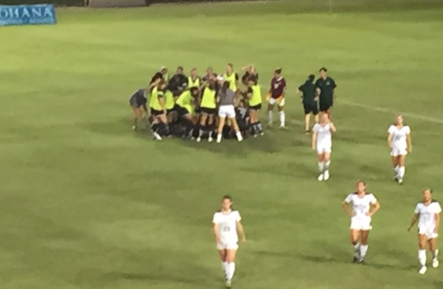 UH dogpiled on the pitch on Storm Kenui's double-overtime winner over Sacramento State.