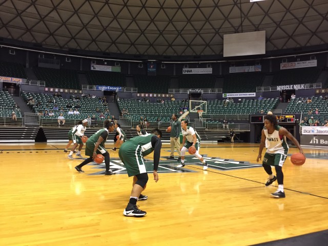 Raibow Wahine warming up prior to the scrimmage.
