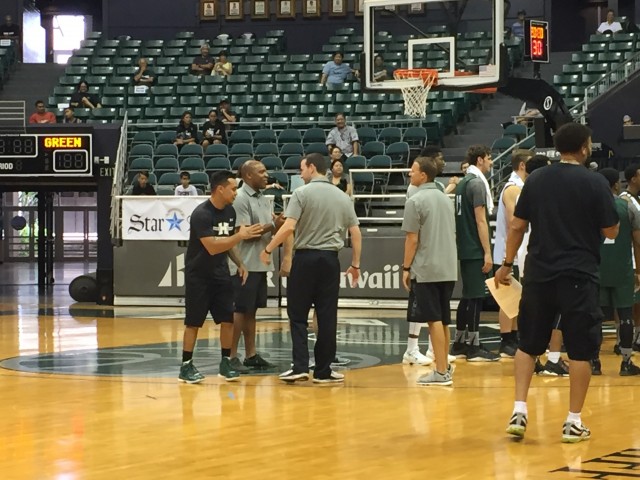 Former point guard Miah Ostrowski shook hands with Eran Ganot during introductions.