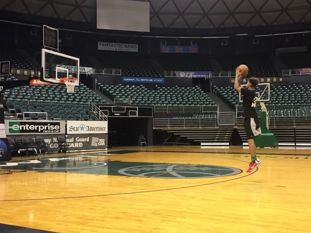 Former Rainbow Warrior Negus Webster-Chan got up shots in the Stan Sheriff Center on Monday.