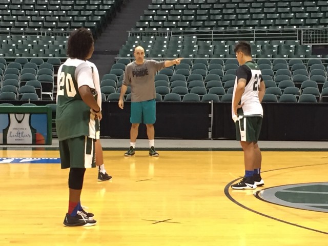 UH associate head coach Alex Delanian provides direction during practice on Tuesday at the Stan Sheriff Center.