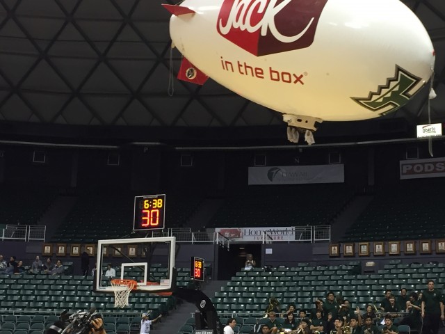 The blimp (and some blatant commercialism) makes a low fly-by at halftime of the UH women's game vs. Grand Canyon. 