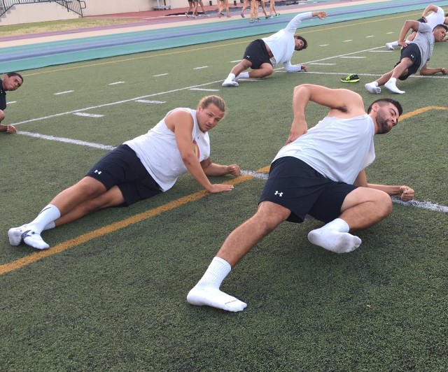 Linebacker Max Broman and tight end Sione Kauhi